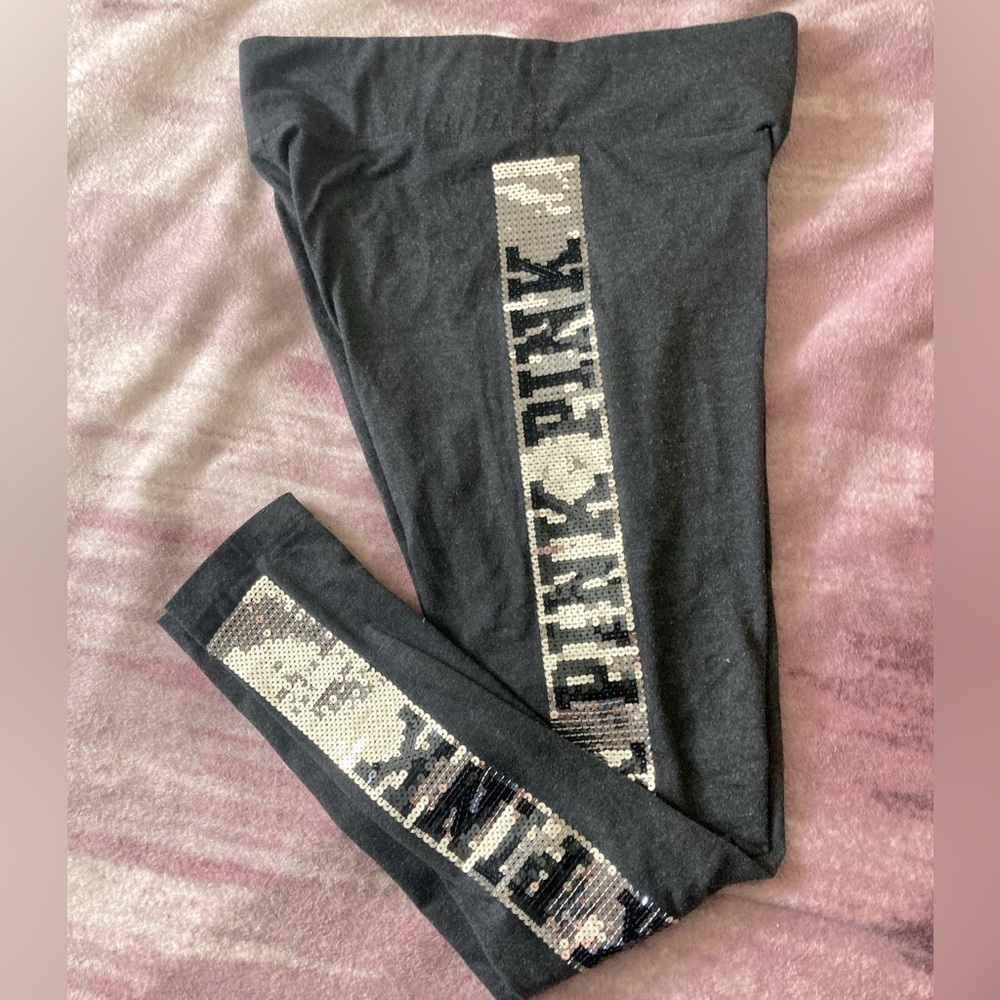 Pink vs bling leggings. Like brand new. Never dried no piling.